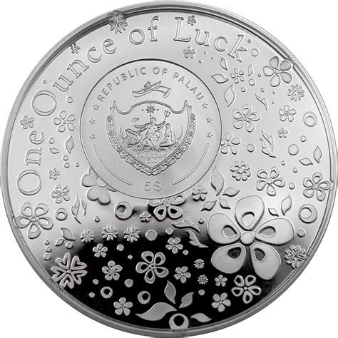 strieborná minca pre novorodenca